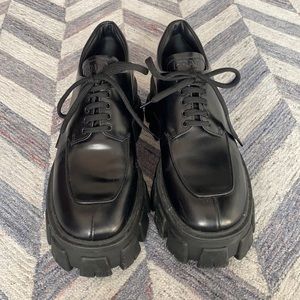 Prada Monolith brushed leather lace-up shoes